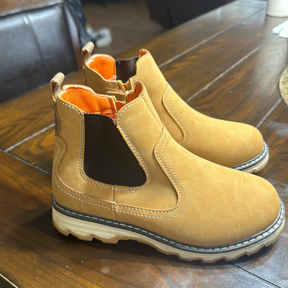 Boys stylish boots. Never been worn in good condition
